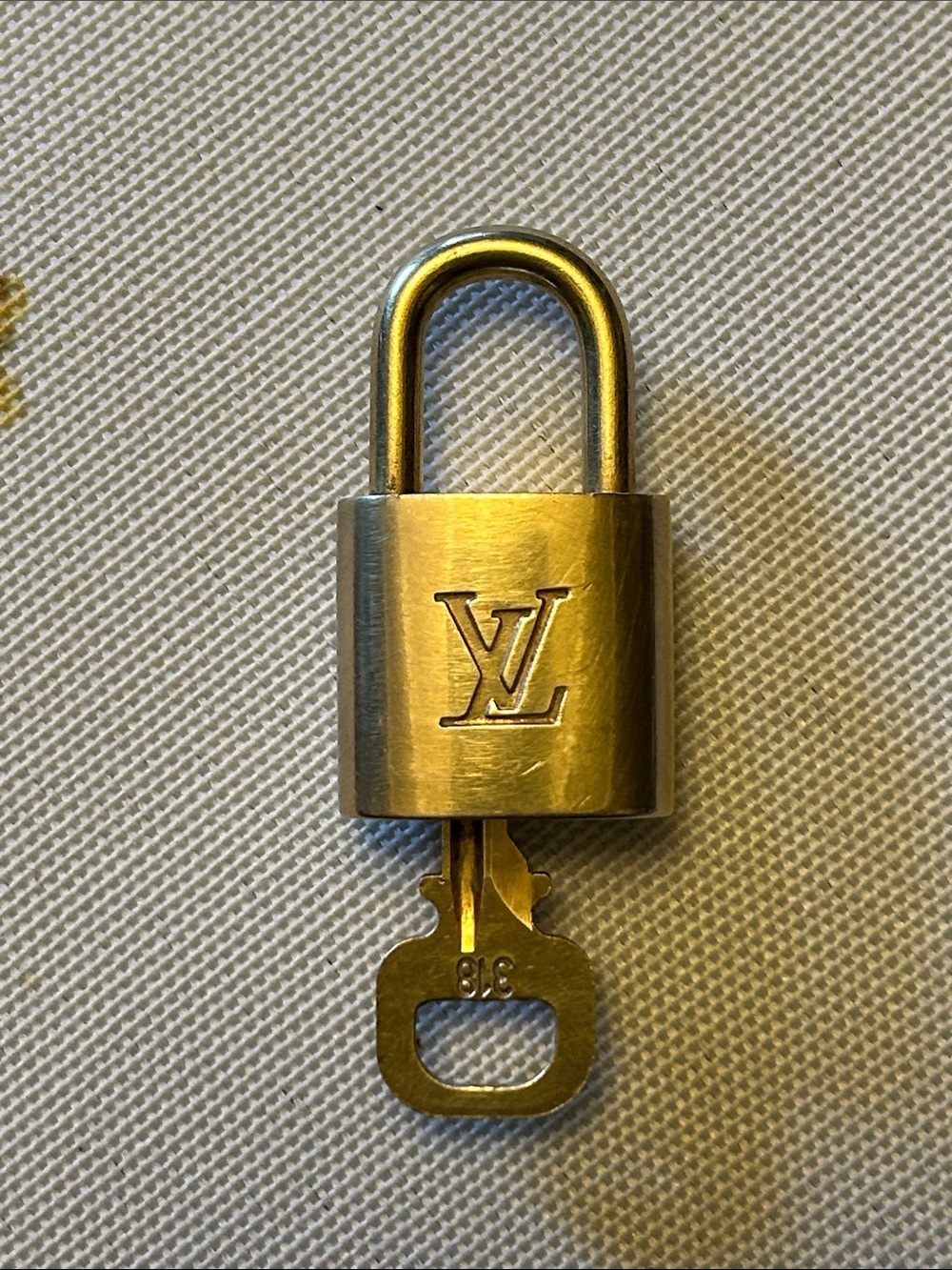Louis Vuitton brass lock and key #318